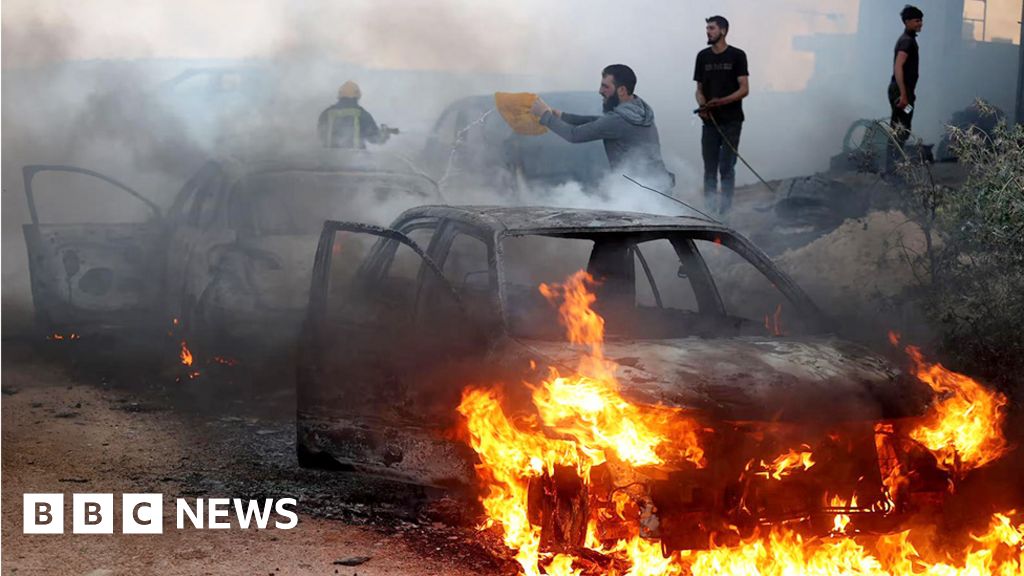 Torched cars in the West Bank village of al-Mughayyir. Settlers burned more than 20 homes and 100 cars during their attacks
