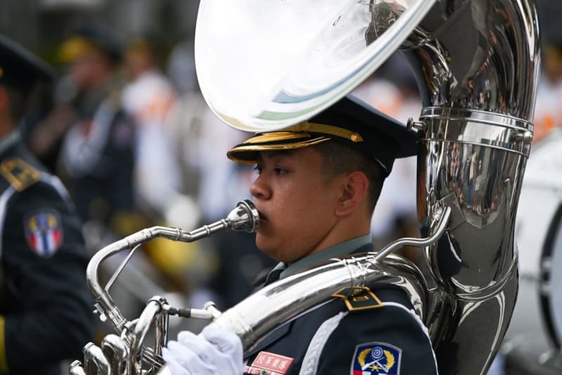 A soldier plays the tuba during a rehearsal. Taiwan's elected President Lai Ching-te is to be inaugurated on May 20. Johannes Neudecker/dpa