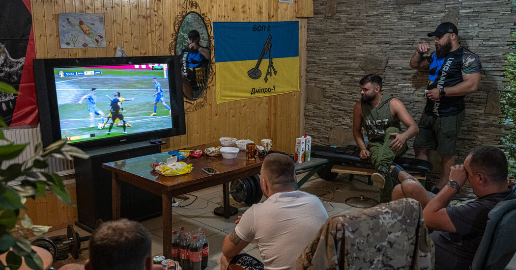 Ukraine’s Soldiers Cheer National Soccer Team in Euro 2024
