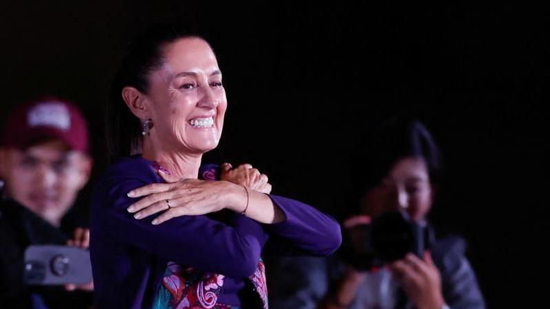 A smiling Claudia Sheinbaum gestures to supporters after being declared the winner of the presidential election in Mexico City, Mexico June 3, 2024