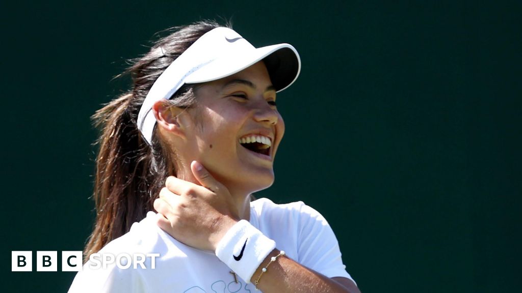 Emma Raducanu laughs during Wimbledon practice