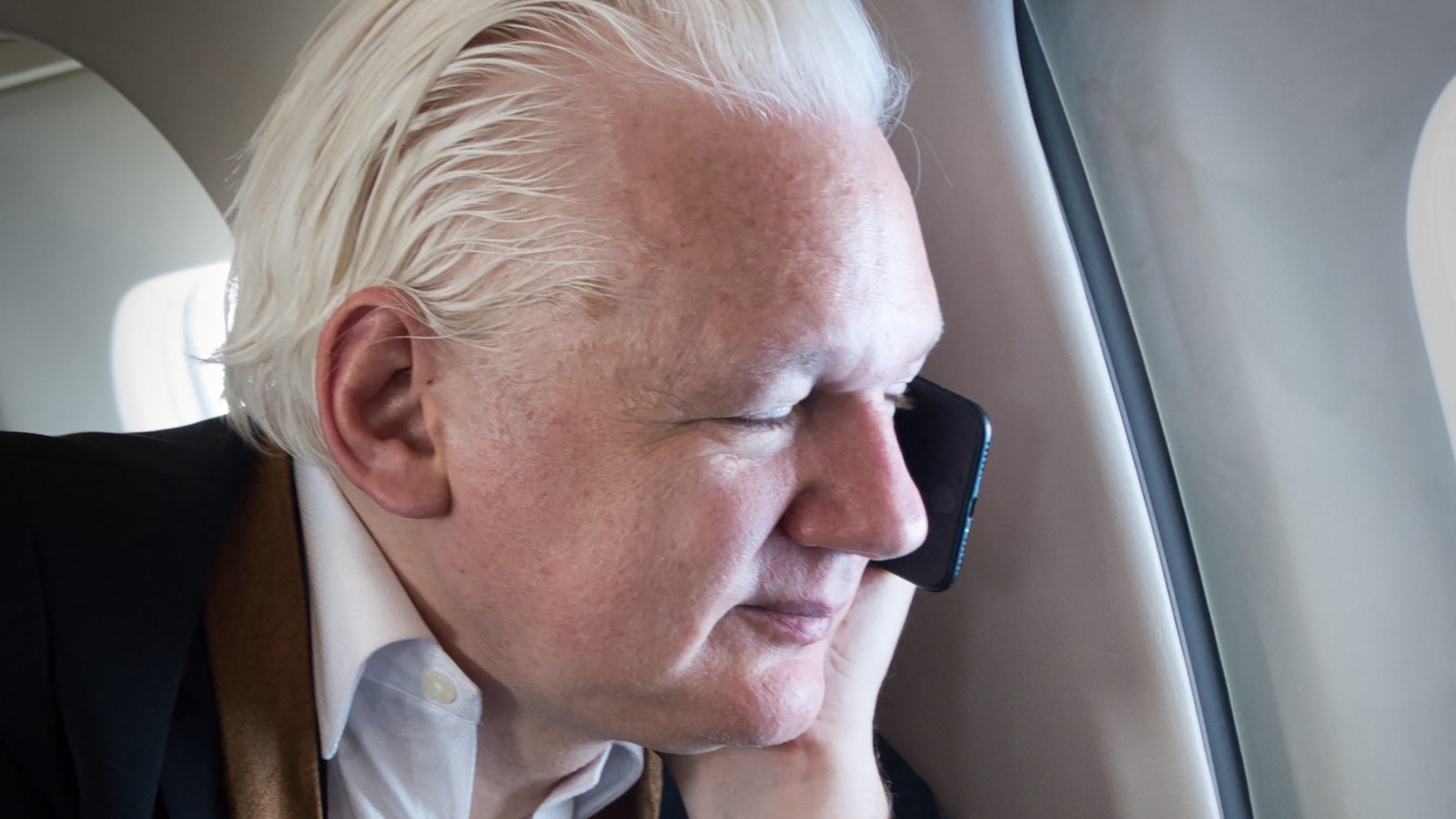 Assange lands in native Australia after pleading guilty in US court