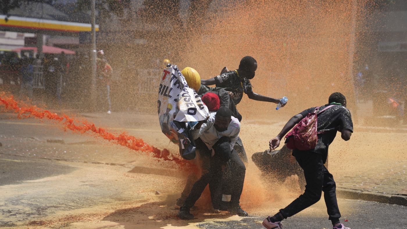 Kenya's parliament burns and police shoot at protesters : NPR