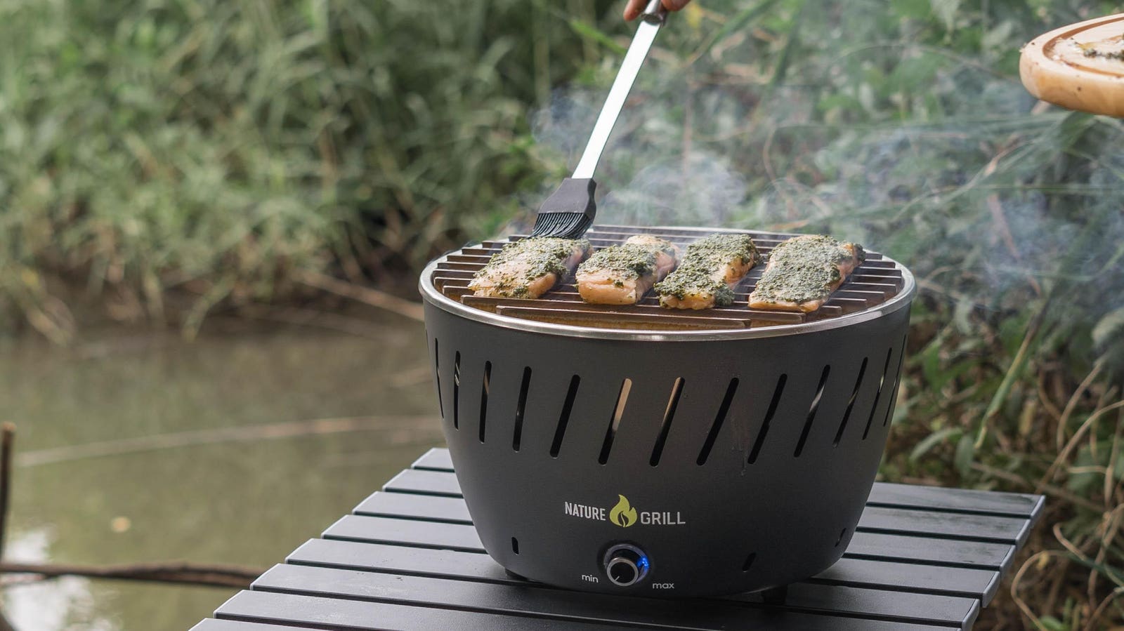 This Portable Charcoal Grill Uses Tech To Quickly Spread The Flame