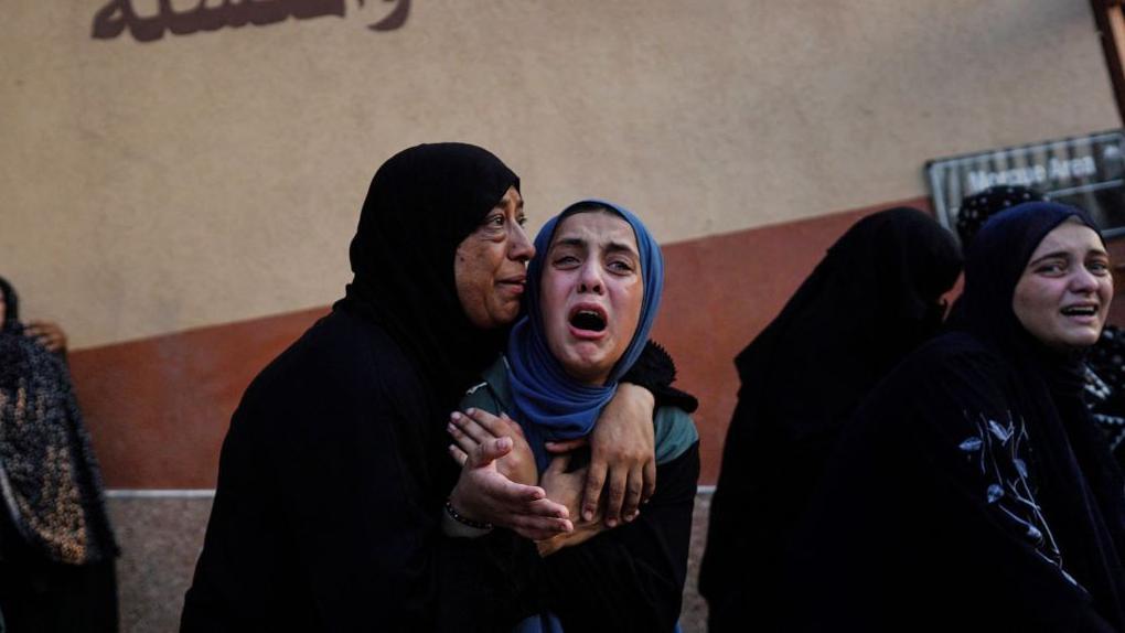 A woman crying in Gaza