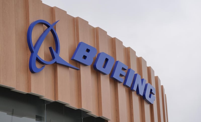 A sign for Boeing is seen at the Farnborough International Airshow. Jonathan Brady/PA Wire/dpa