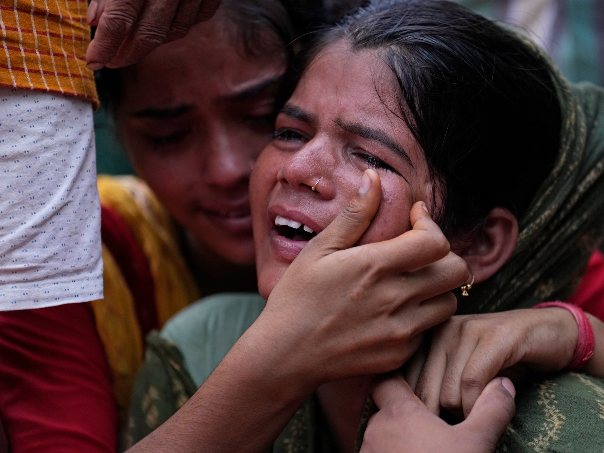 Families of India stampede victims ponder future without loved ones | Religion News