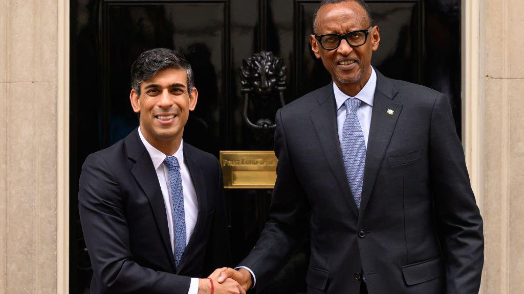Rwandan President Paul Kagame (R) is greeted by Britain's Prime Minister Rishi Sunak (L) as he arrives at Downing Street on April 09, 2024.