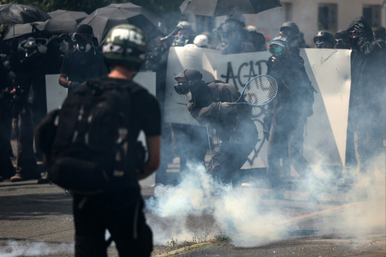 Some marchers appeared to be equipped for a showdown with police (ROMAIN PERROCHEAU)