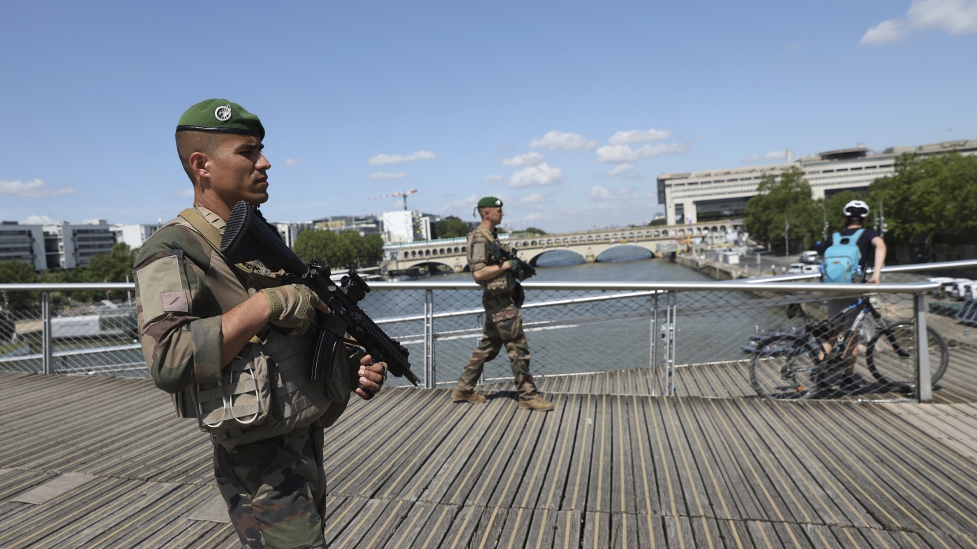 Paris police are sealing off the Seine River ahead of the Olympics opening ceremony : NPR