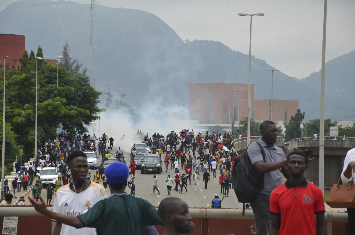 Rights group says 13 killed during protests over Nigeria's economic crisis. Hundreds arrested