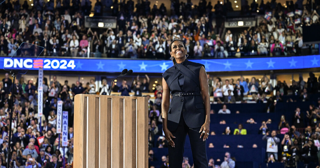 Michelle Obama’s Show of Strength at the DNC in Black Monse Suit