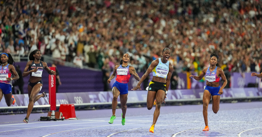 St. Lucia gets its first gold medal, thanks to the world’s fastest woman.