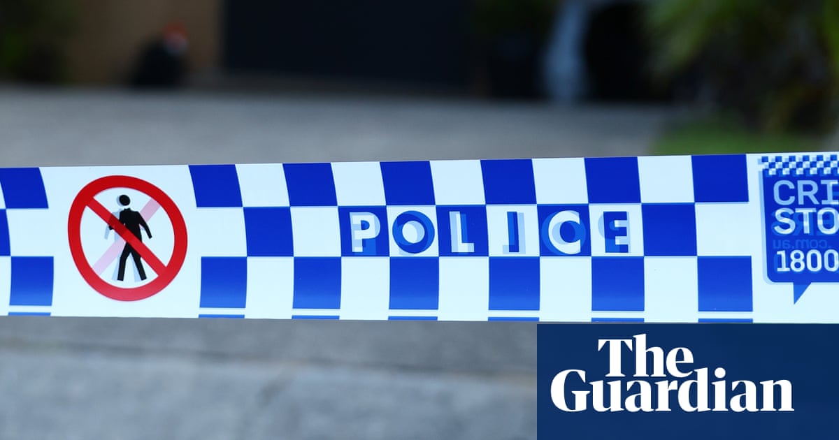 Man fighting for life after being shot by police outside Queensland hospital | Queensland