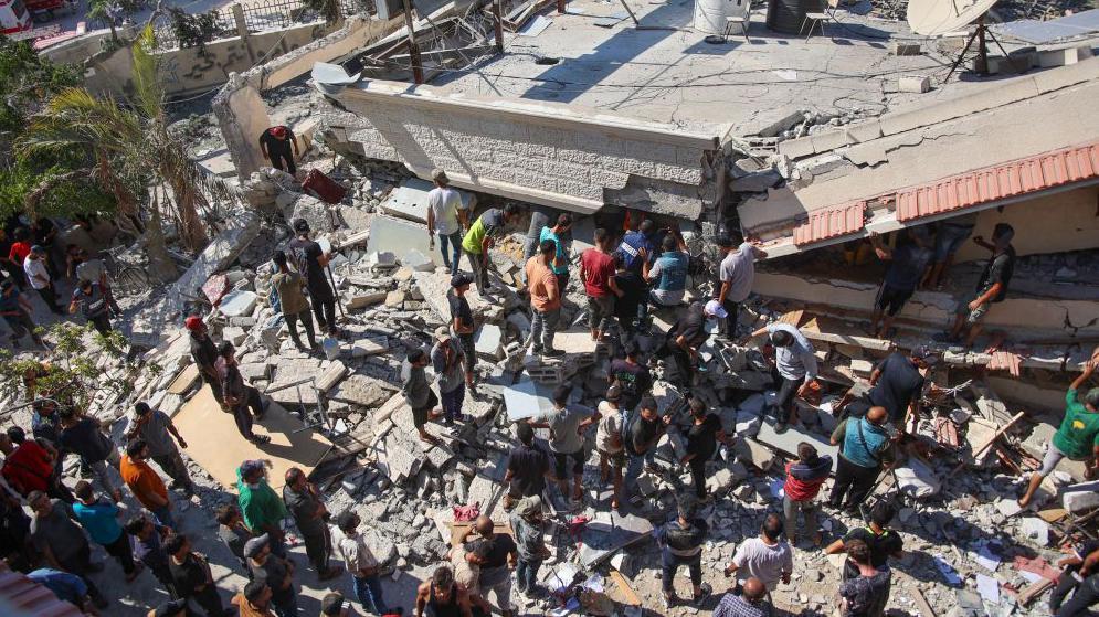 Rescuers searched for survivors of the strike on the al-Nasr School in Gaza City