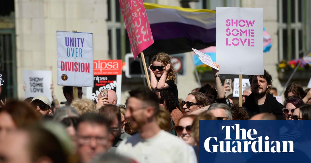 About 15,000 join Belfast anti-racism rally after week of rioting | UK news