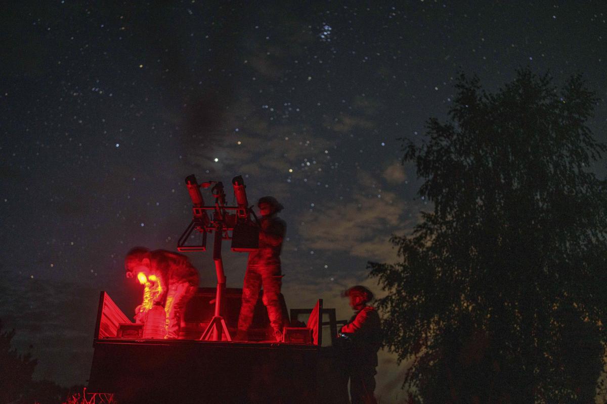 With men at the front lines, women watch over Ukraine's night sky for Russian drones