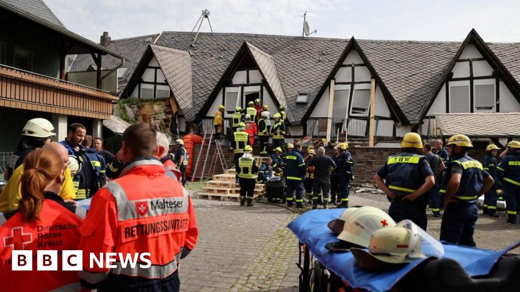 German hotel collapse kills two, trapping others under rubble