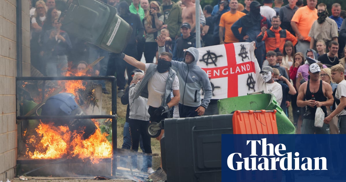 Rioters try to torch Rotherham asylum seeker hotel amid far-right violence | UK news