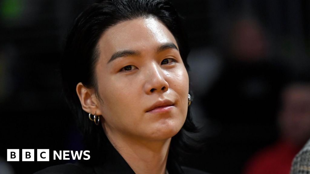 Suga apologises for driving scooter under influence