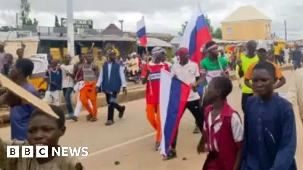 About 40 arrested for waving Russian flags