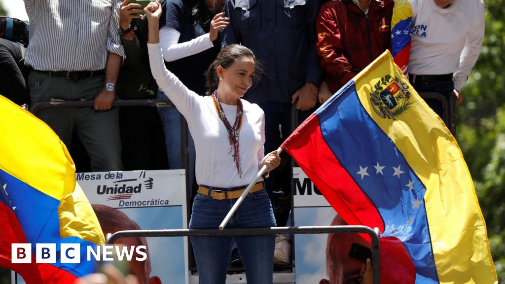 Venezuelan opposition leader addresses rally amid arrest threat