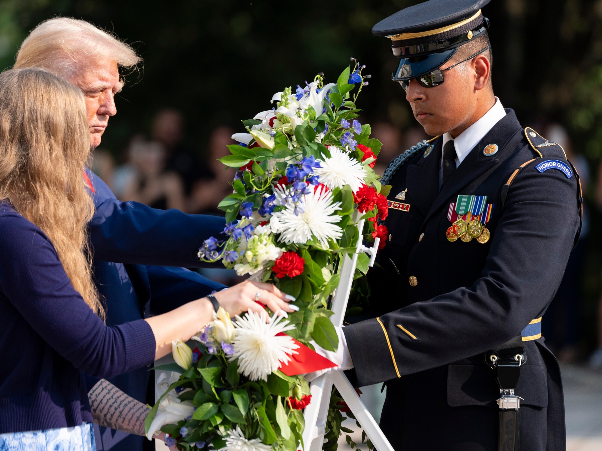 US Army defends Arlington cemetery employee pushed during Trump visit | Donald Trump News