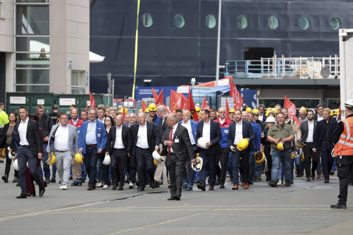 Germany's Scholz pledges that his government will help rescue a troubled cruise ship maker