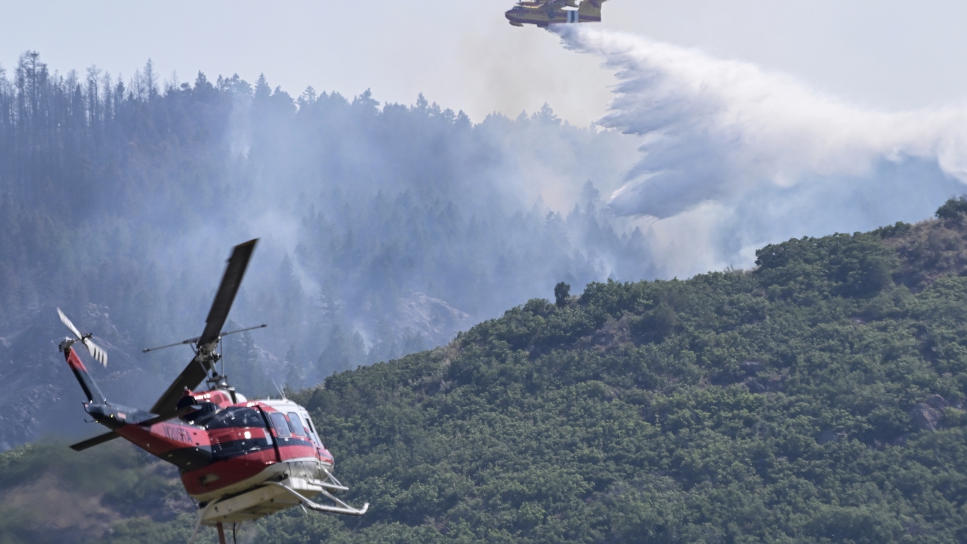 Firefighters continue battling massive wildfire in California ahead of thunderstorms : NPR