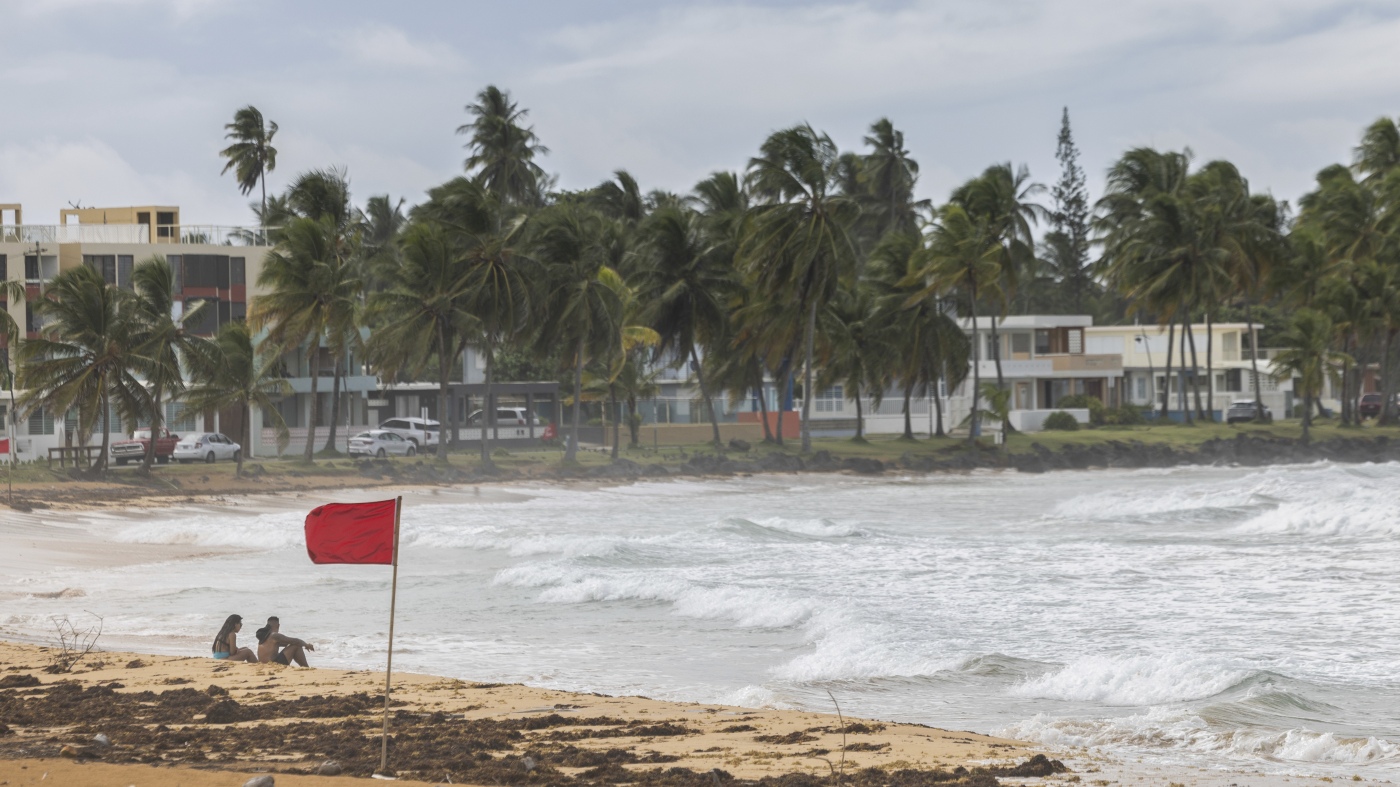 Ernesto becomes a hurricane, knocks out power in Puerto Rico : NPR