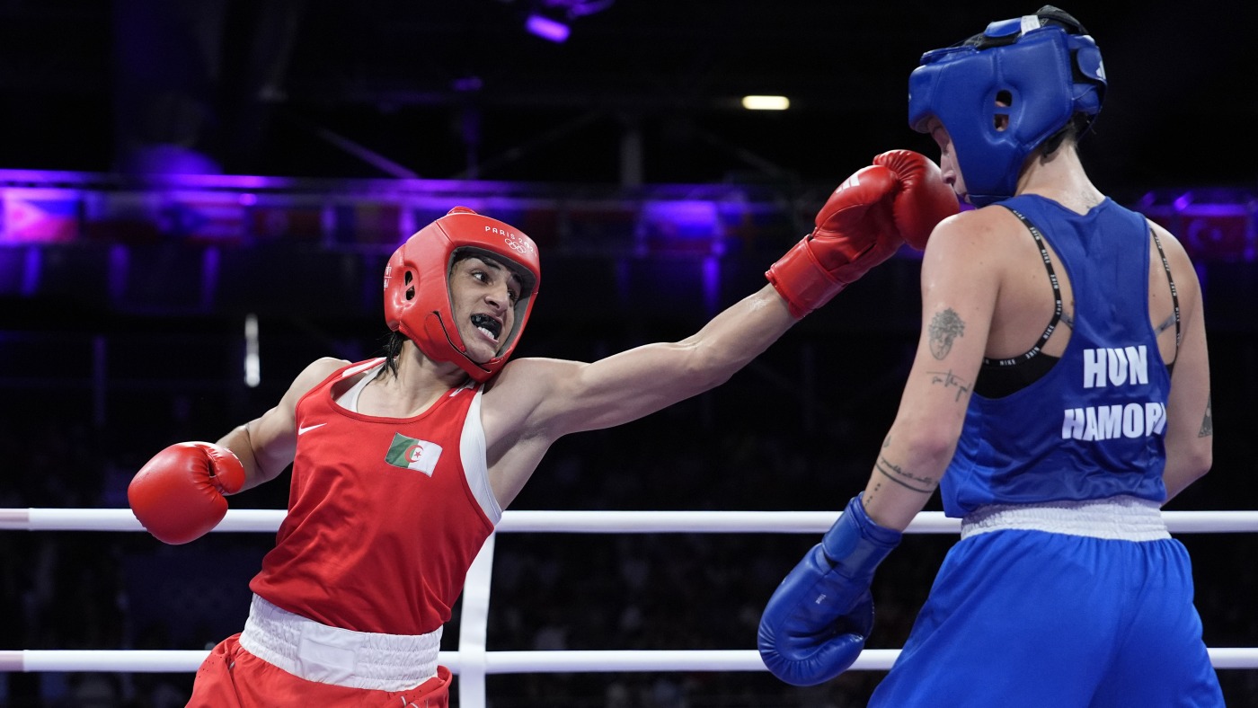 Algerian boxer Imane Khelif clinches Olympic medal after gender outcry : NPR