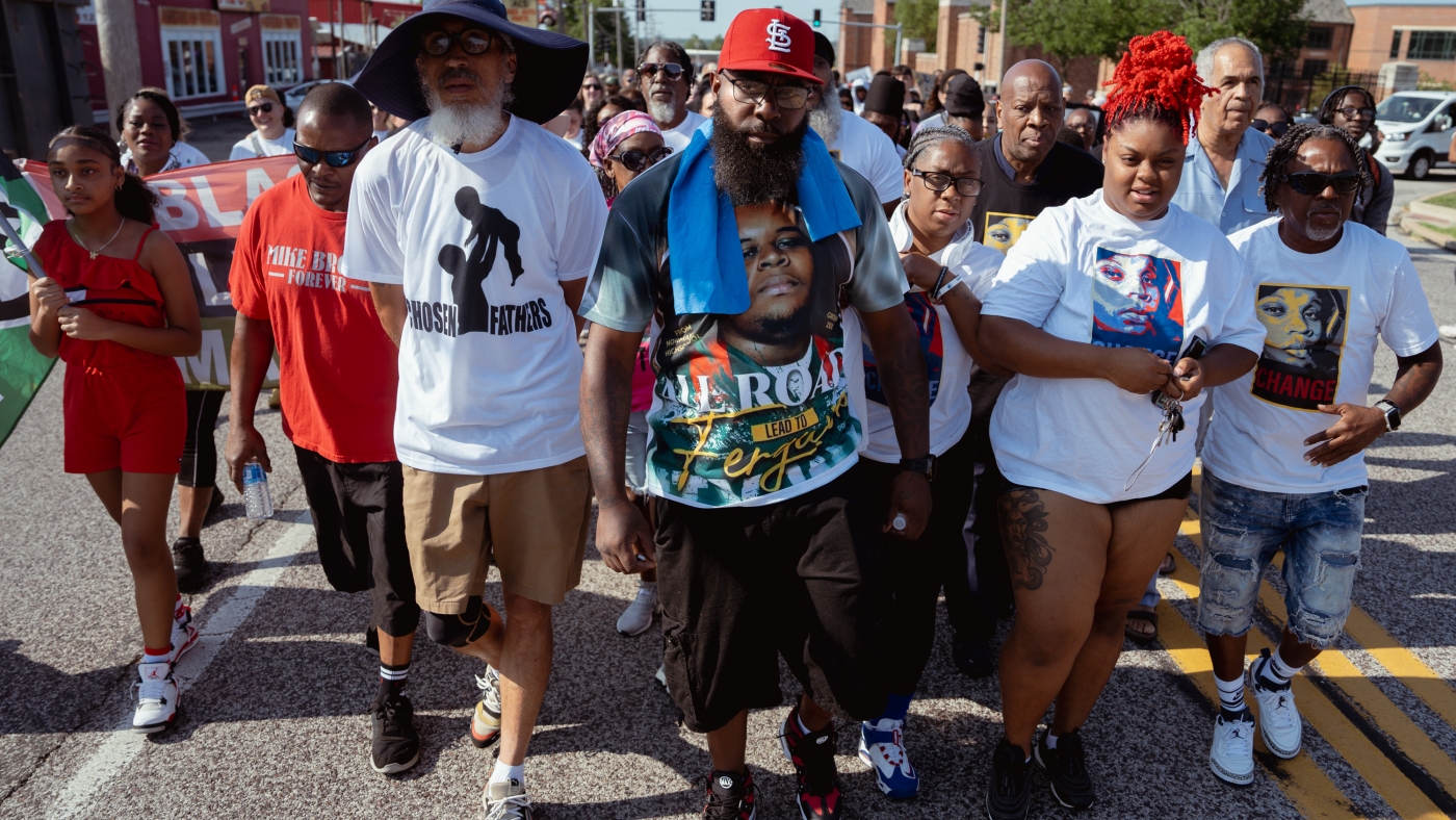 Family of Michael Brown Jr. marches on Ferguson 10 years later : The Picture Show : NPR