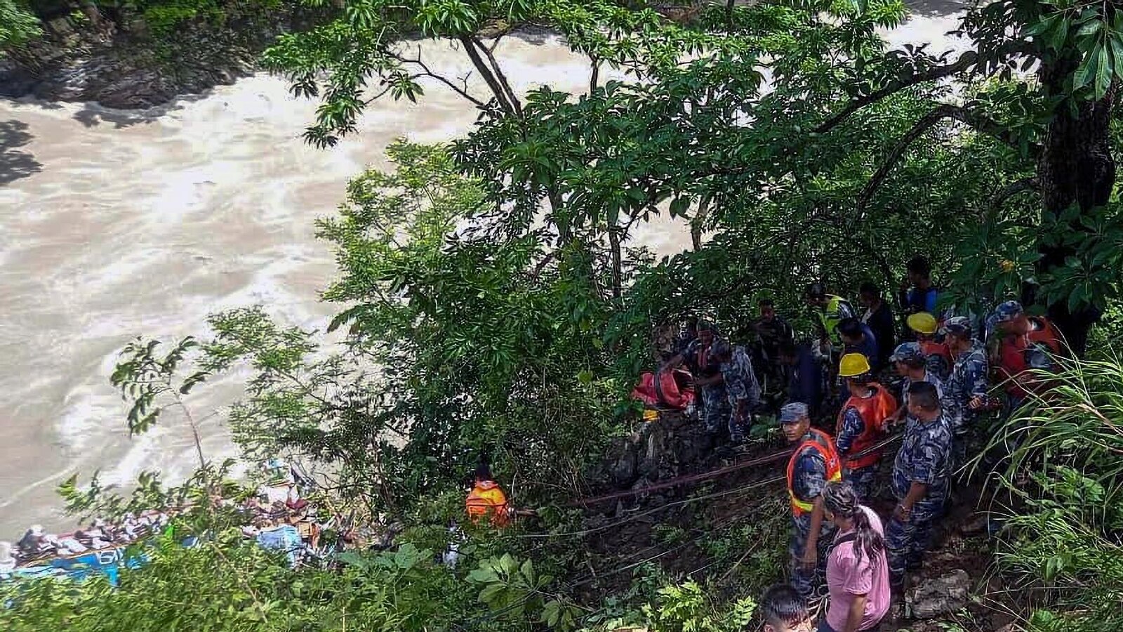 14 killed, 16 injured and more missing after a bus drives off a Nepal highway