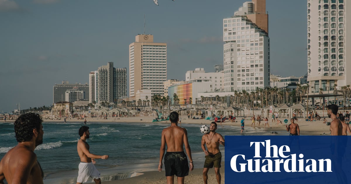 ‘We always felt safer here’: Tel Aviv unmoved by Hezbollah missile attack | Israel