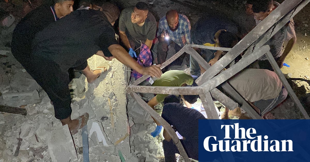 Senior Gaza aid official and family killed by Israeli airstrike on home | Israel-Gaza war