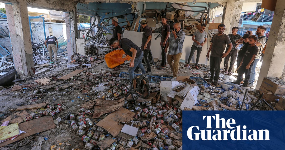 Six Unrwa workers among estimated 14 killed in Israeli strike on Gaza school sheltering displaced | Israel-Gaza war