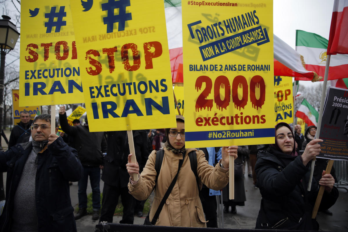 Iran executes 2 men in public over killing of police officer