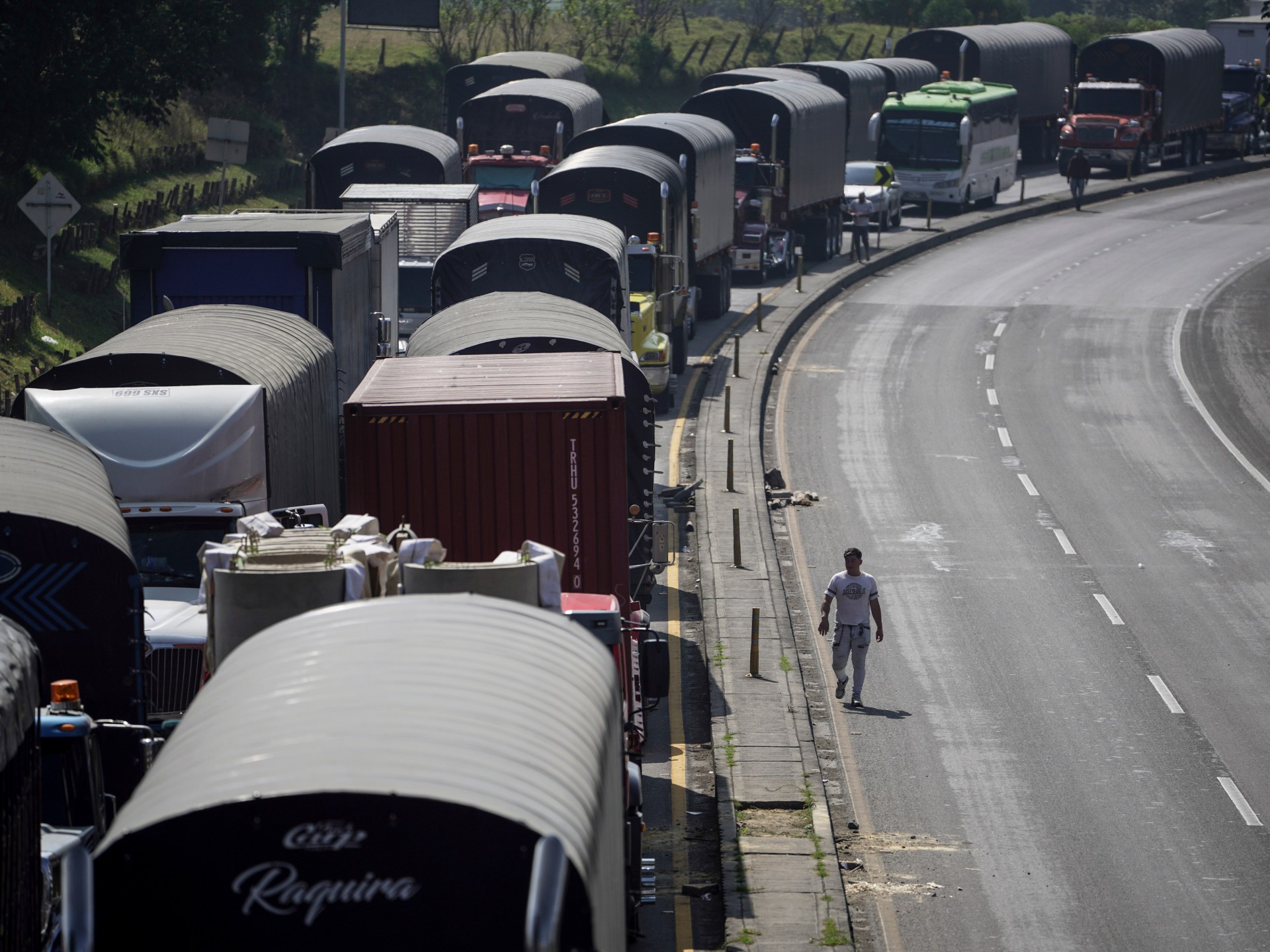 Road blocks lifted as Colombia reaches deal with striking truckers | Coronavirus pandemic News