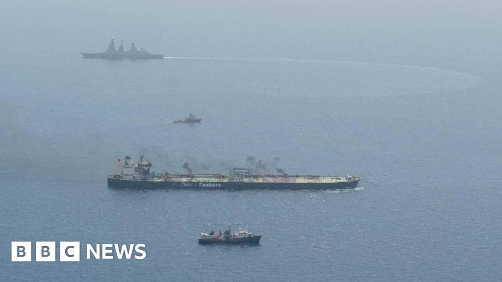 Burning oil tanker towed to safety to avert Red Sea spill