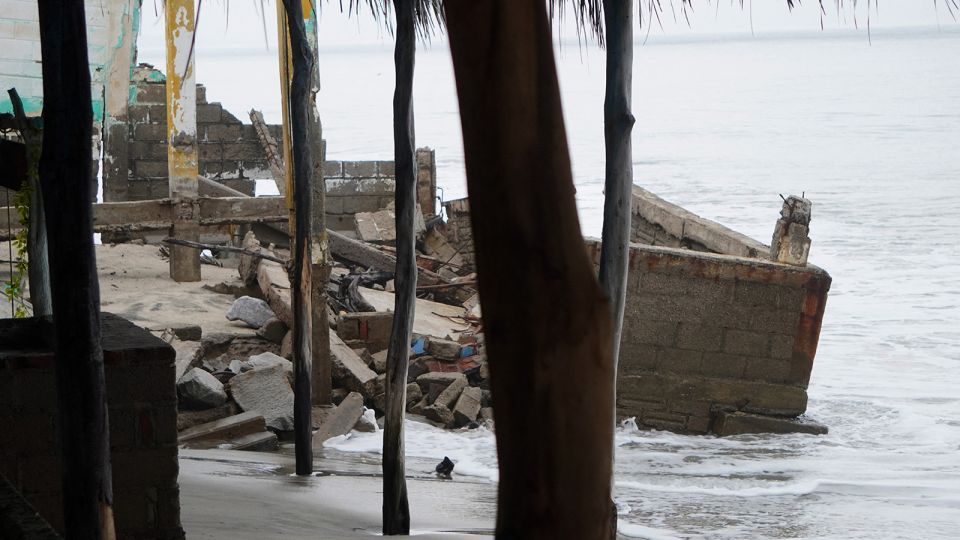 Tropical Storm John triggers warnings of life-threatening floods after slamming into Mexico