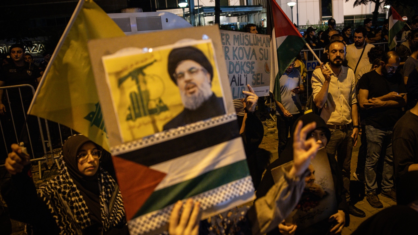 Hezbollah leader's death sparks joy and rage across the Middle East : NPR