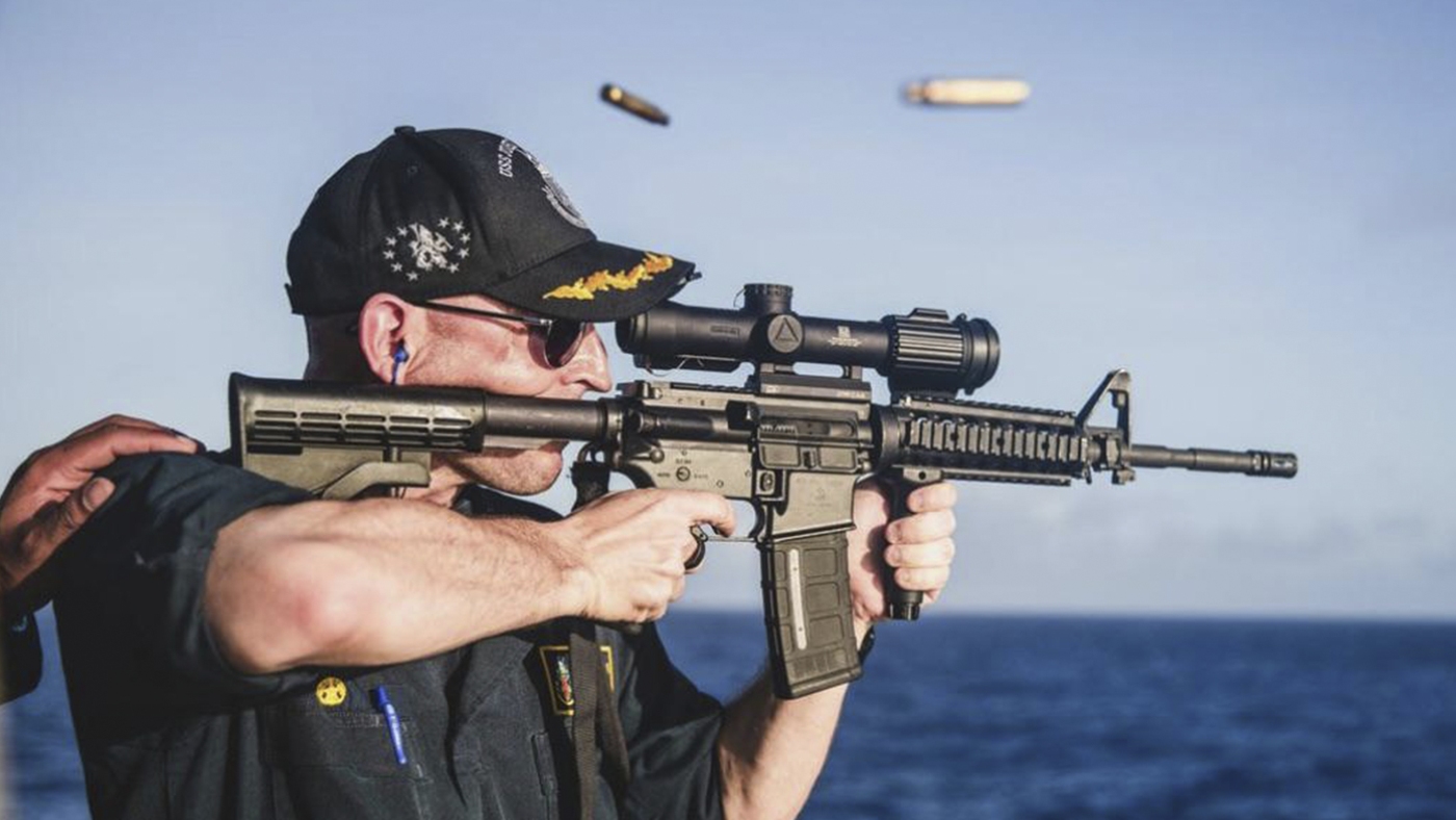 Navy commander relieved of duty after firing rifle with scope backward : NPR