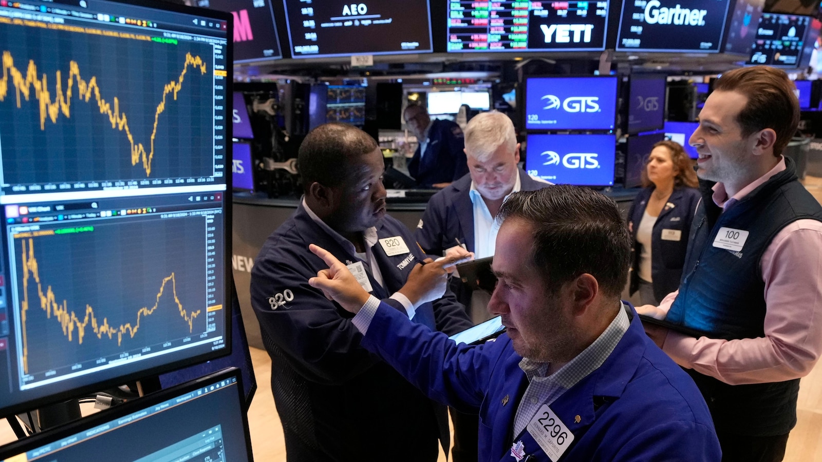 Wall Street soars to records as Dow leaps 500 in rate-cut rally that swept the world