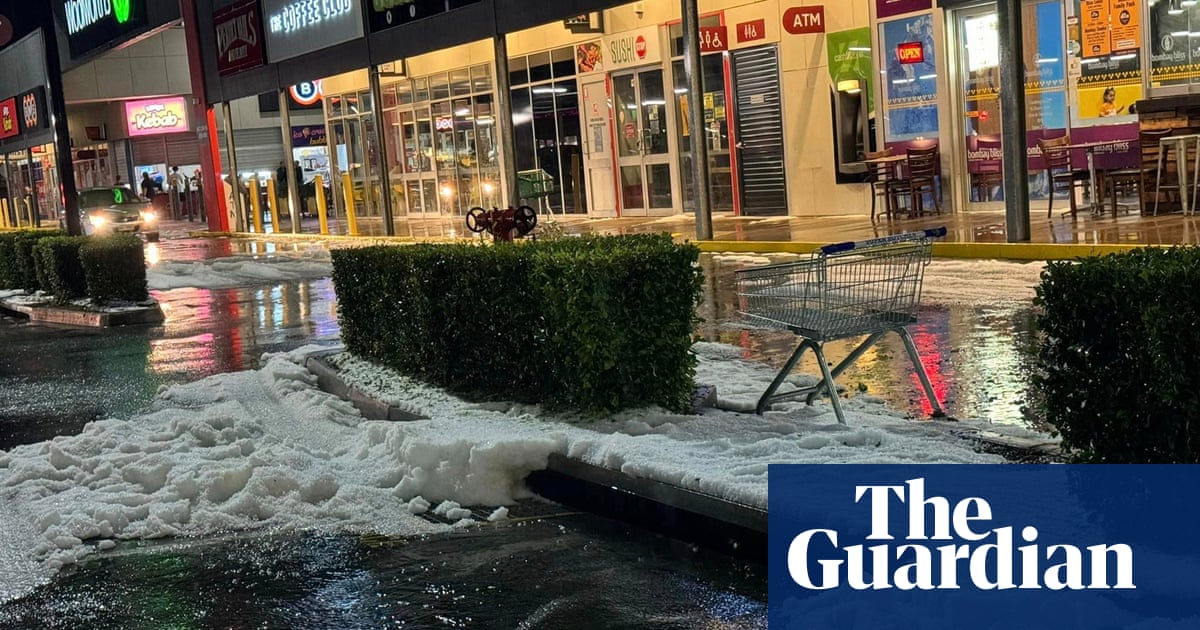 Wild weather lashes Queensland, with rainstorms bringing down ceilings and hail falling like snow | Australia weather