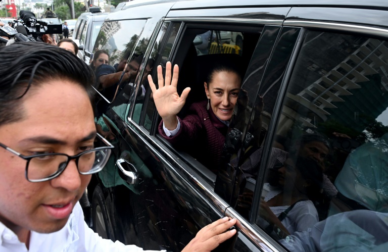 Mexican President Claudia Sheinbaum visited hurricane-hit Acapulco a day after taking office (Francisco ROBLES)