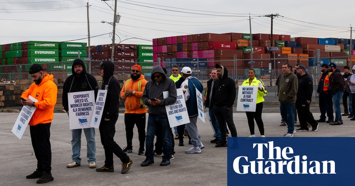 Striking US port workers sound resolute note: ‘This is for our future generations’ | US unions