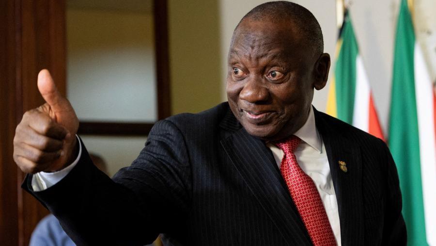 South Africa's President Cyril Ramaphosa gestures to a journalist after a media briefing, at the Union Building in Pretoria, South Africa, September 13, 2024