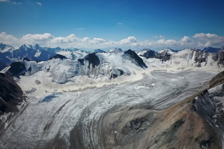 Glaciers are thick masses of ice that form on land from centuries of compressed snow (ARSENY MAMASHEV)