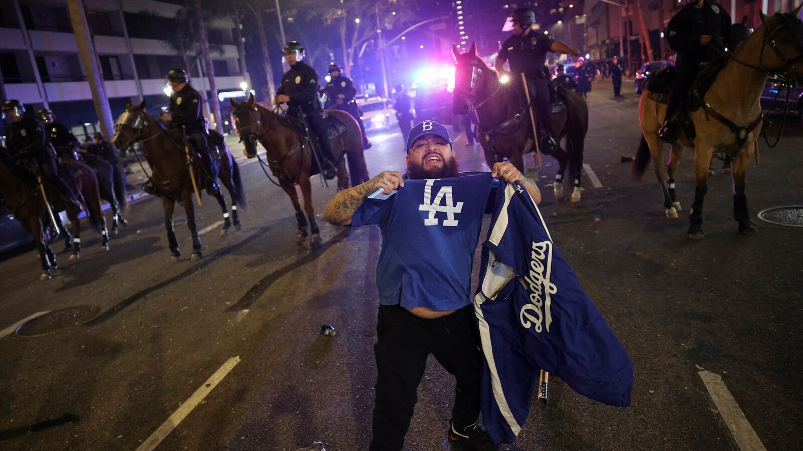 Officers clash with 'hostile' baseball fans in Los Angeles after Dodgers win, police say