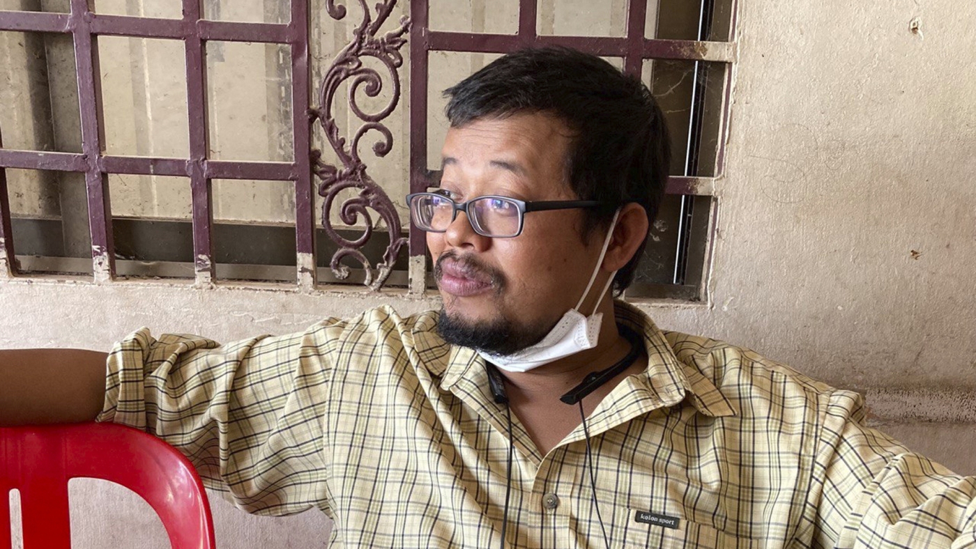 Cambodian reporter who exposed scams charged over online posts : NPR